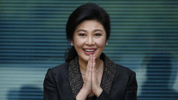 Thai court acquits former PM over mishandling of government funds